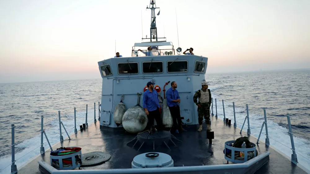 ﻿Members of the Libyan Coast Guard search for migrants off the coast of Tripoli, Libya, August 9, 2017. REUTERS/Hani Amara