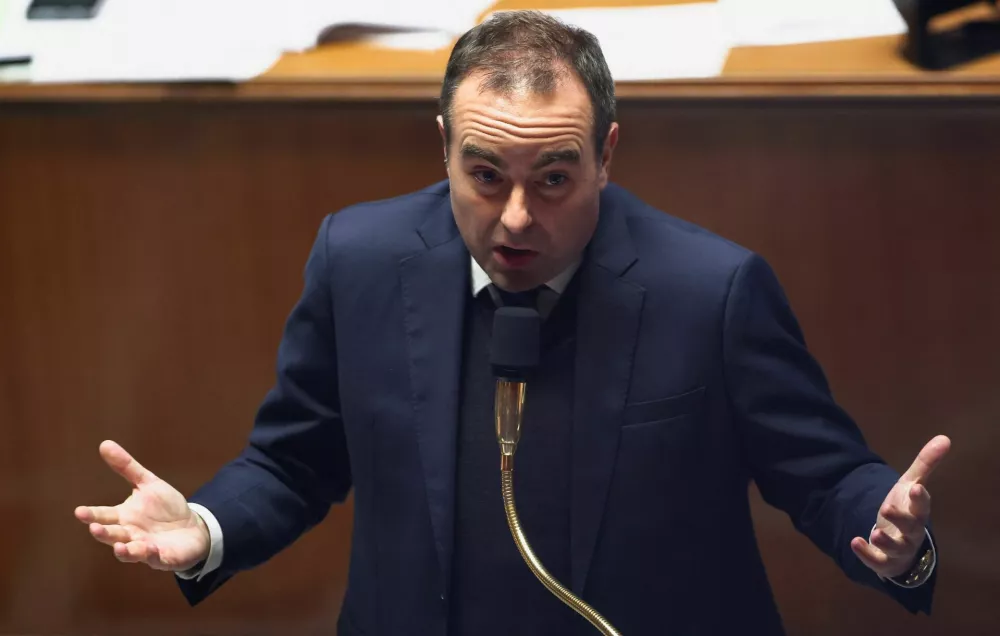 French Prime Minister Sebastien Lecornu speaks as he attends the questions to the government session at the National Assembly in Paris, France, November 12, 2025. REUTERS/Gonzalo Fuentes
