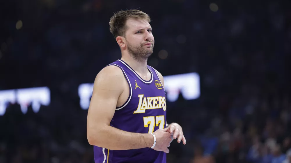 Nov 12, 2025; Oklahoma City, Oklahoma, USA; Los Angeles Lakers guard Luka Doncic reacts to a fan during the second quarter of a game against the Oklahoma City Thunder at Paycom Center. Mandatory Credit: Alonzo Adams-Imagn Images