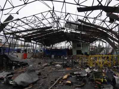 A commercial facility is seen heavily damaged by a Russian strike on Kharkiv, Ukraine, Wednesday, Nov. 12, 2025. (AP Photo/Andrii Marienko)