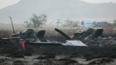 Wreckage lies at the site of the Turkish C-130 military cargo plane crash near the Azerbaijani border, in Sighnaghi municipality, Georgia, November 12, 2025. REUTERS/Irakli Gedenidze