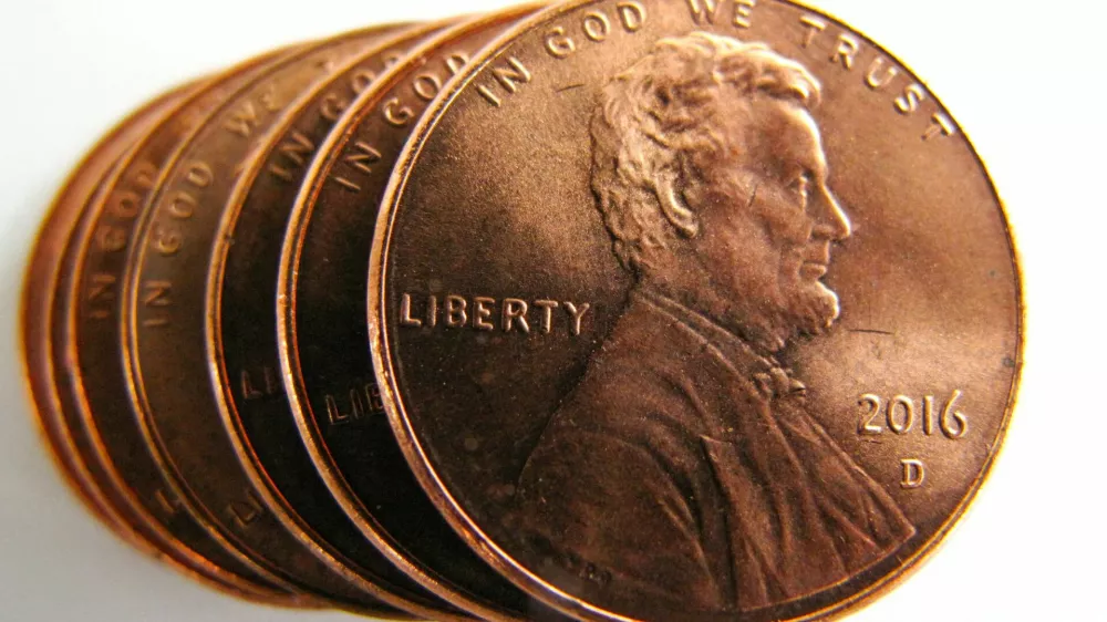 FILE PHOTO: One-cent U.S. coins known as the penny are shown in this illustration picture, after U.S. President Trump informed on his Truth Social media account that he instructed the Secretary of the US Treasury to stop producing new pennies, February 11, 2025. REUTERS/Mike Blake/File Photo