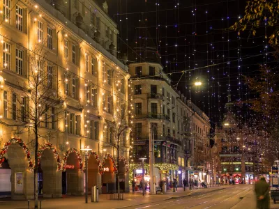 Zruich, Switzerland - January 02.2022: Bahnhof Street in the Zurich city center on the Christmas season with festival illumination.