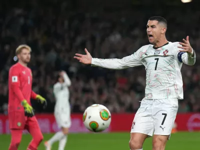 Portugal's Cristiano Ronaldo reacts during a World Cup 2026 group F qualifying soccer match between Ireland and Portugal in Dublin, Thursday, Nov. 13, 2025. (Niall Carson/PA via AP)