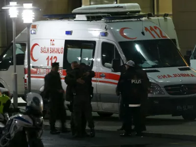 ﻿Members of Turkish police special forces unit hug each other at the end of the hostage situation at the Justice Palace in Istanbul March 31, 2015. A website with links to a Turkish far-left group which has been holding a prosecutor captive in Istanbul said on its Twitter feed late on Tuesday that the hostage had been shot and injured, whilst his three captors had been killed. "Our three friends have been shot to death," one tweet read. It was not possible to independently verify the information. The tweets were posted shortly after gunfire was heard at the building and two ambulances were seen racing away from the scene, according to a Reuters witness. REUTERS/Osman Orsal