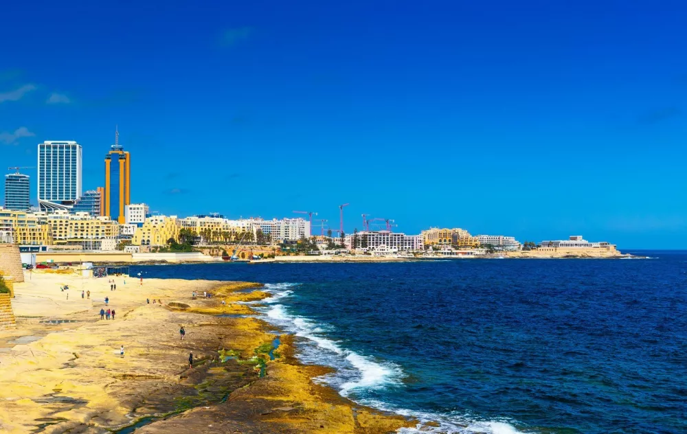 View of the coastline in Sliema, skyscrapers in Paceville district, Malta.,Image: 991248708, License: Royalty-free, Restrictions:, Model Release: no