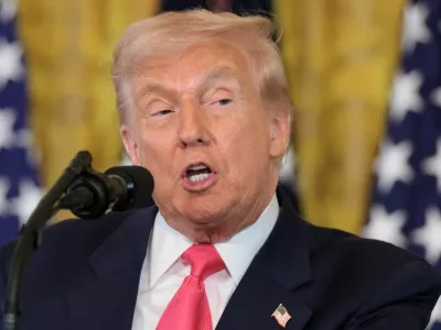FILE PHOTO: U.S. President Donald Trump speaks on the day he is set to sign an executive order on "Fostering the Future" in the East Room of the White House, in Washington, D.C., U.S., November 13, 2025. REUTERS/Jonathan Ernst/File Photo