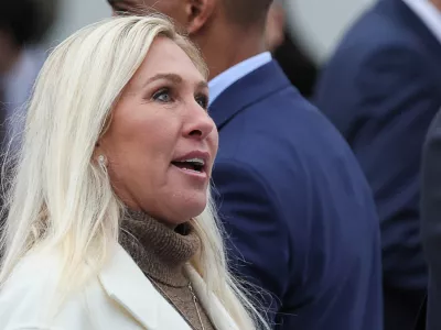 FILE PHOTO: U.S. Rep. Marjorie Taylor Greene (R-GA) looks on, ahead of President Donald Trump delivering remarks on tariffs, in the Rose Garden at the White House in Washington, D.C., U.S., April 2, 2025. REUTERS/Leah Millis/File Photo