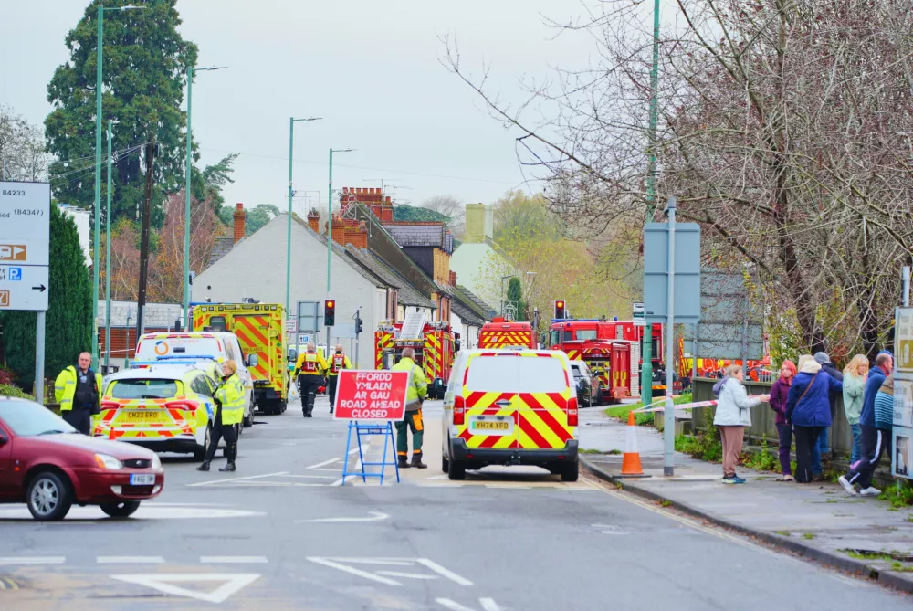 Emergency services on Cinderhill Sreet after severe flooding due to Storm Claudia, in Monmouth, South Wales, Saturday, Nov. 15, 2025. (Ben Birchall/PA via AP)