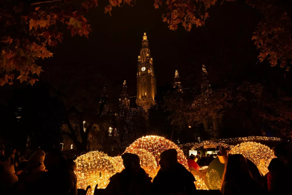 People visit the Wiener Christkindlmarkt in front of Vienna's city hall, one of the city's most popular Christmas markets, in Vienna, Austria, November 15, 2025. REUTERS/Elisabeth Mandl