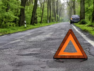 damaged car on a country road after a breakdown