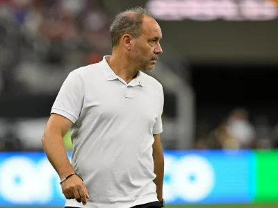 FILE PHOTO: Jun 22, 2025; Arlington, Texas, USA; Haiti head coach Sebastien Migne looks on during the first half against the United States of America during a group stage match of the 2025 Gold Cup at AT&T Stadium. Mandatory Credit: Jerome Miron-Imagn Images/File Photo