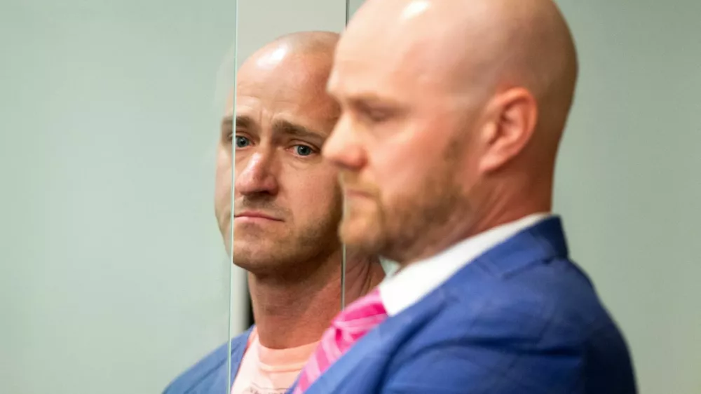 FILE PHOTO: Joseph David Emerson, 44, an Alaska Airlines pilot who was riding in the cockpit "jump seat" and is accused of trying to disable the engines of a Horizon Air jet, appears in Multnomah County court in Portland, Oregon, U.S. October 24, 2023. Dave Killen/Pool via REUTERS/File Photo