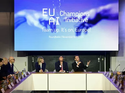 France's President Emmanuel Macron addresses investors next to German chancellor Friedrich Merz and Managing director and Head of Europe at General Catalyst Jeannette zu Fürstenberg at the EU AI Champions Initiative at a summit on Europe's technological sovereignty, in the EUREF Campus in Berlin, Germany, November 18, 2025. JOHN MACDOUGALL/Pool via REUTERS