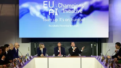 France's President Emmanuel Macron addresses investors next to German chancellor Friedrich Merz and Managing director and Head of Europe at General Catalyst Jeannette zu Fürstenberg at the EU AI Champions Initiative at a summit on Europe's technological sovereignty, in the EUREF Campus in Berlin, Germany, November 18, 2025. JOHN MACDOUGALL/Pool via REUTERS