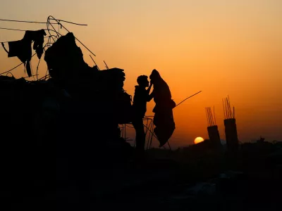 A Palestinian stands among the ruins of buildings, amid a ceasefire between Israel and Hamas, in the northern Gaza Strip November 19, 2025. REUTERS/Mahmoud Issa