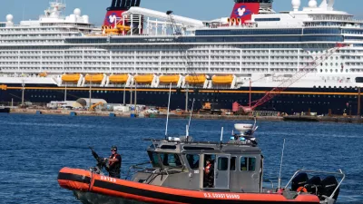 A U.S. Coast Guard boat patrols in front of a cruise ship during a media event showcasing cocaine seizures, Wednesday, Nov. 19, 2025, at Port Everglades in Fort Lauderdale, Fla. (AP Photo/Rebecca Blackwell)