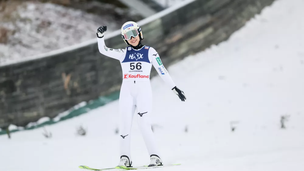 Japan's Nozomi Maruyama celebrates as she wins the women's world cup ski jumping in Lillehammer, Norway, Saturday Nov. 22, 2025. (Geir Olsen/NTB Scanpix via AP)