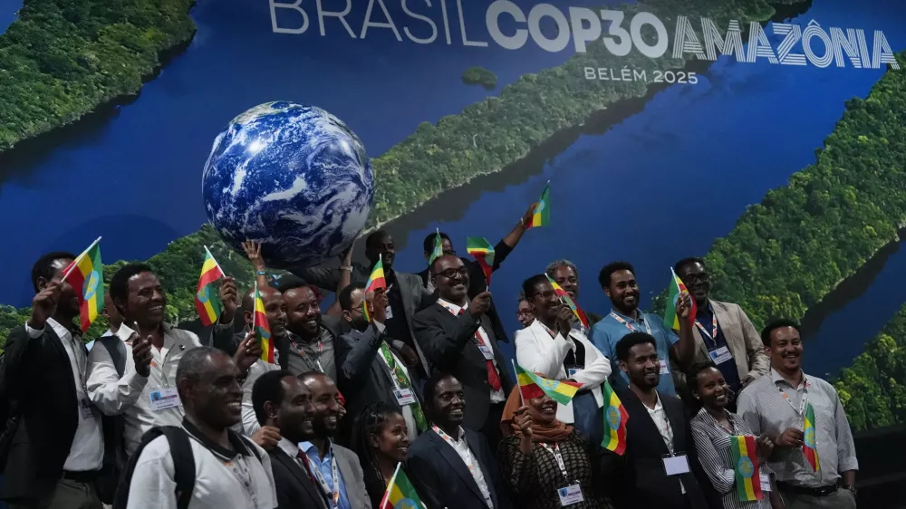 Delegates from Ethiopia, host of COP32, pose for a photo at the COP30 U.N. Climate Summit, Saturday, Nov. 22, 2025, in Belem, Brazil. (AP Photo/Joshua A. Bickel)
