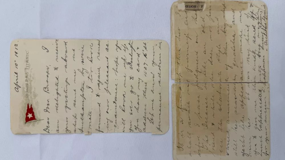 This undated handout picture provided by the auctioneers Henry Aldridge & Son, England, shows a lettercard, penned by one of the Titanic's most well-known survivors from onboard the ship days before it sank, which has sold for 300,000 pounds ($399,000) at auction. (Henry Aldridge & Son via AP)