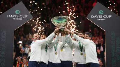 23 November 2025, Italy, Bologna: Italy players celebrate after winning the 2025 Davis Cup final match between Italy and Spain at Bologna Fiere. Photo: Massimo Paolone/LaPresse via ZUMA Press/dpa