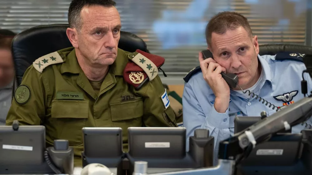 FILED - 26 October 2024, Israel, Tel Aviv: Chief of Israeli General Staff Herzi Halevi (L) and Commander of the Israeli Air Force Tomer Bar sit in an underground command center of the Israeli Air Force at Camp Rabin (Kirya) directing an attack on Iran. Israeli Chief of the General Staff Herzi Halevi has resigned, citing failures by the Israeli military regarding the Hamas-led October 7 attacks, a military spokesman said on Tuesday. Photo: -/IDF/X/dpa - ACHTUNG: Nur zur redaktionellen Verwendung und nur mit vollständiger Nennung des vorstehenden Credits