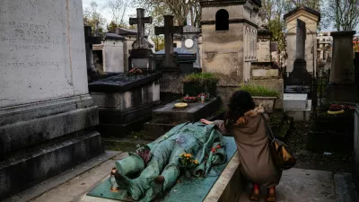 A woman touches the Recumbent Effigy of French journalist Victor Noir, who was shot and killed by Prince Pierre Bonaparte, a cousin of the French Emperor Napoleon III in 1870, at the Pere-Lachaise cemetery in Paris on November 10, 2024.,Image: 933070151, License: Rights-managed, Restrictions:, Model Release: no