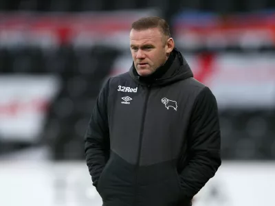 ﻿16 January 2021, United Kingdom, Derby: Derby County's manager Wayne Rooney reacts on the touchline during the English EFL Championship soccer match between Derby County and Rotherham United at Pride Park. Photo: Nigel French/PA Wire/dpa