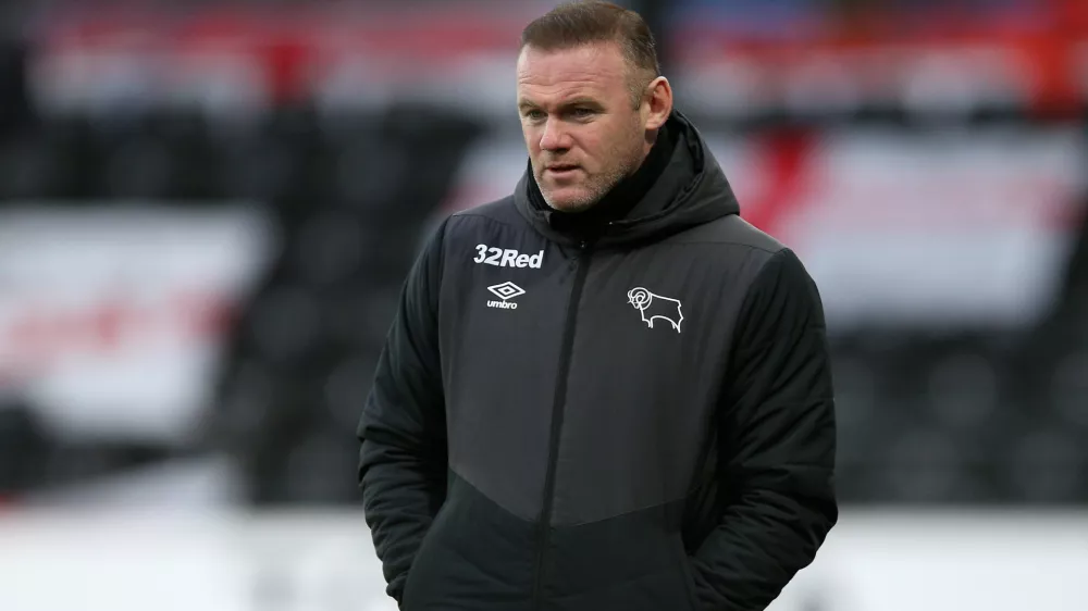 ﻿16 January 2021, United Kingdom, Derby: Derby County's manager Wayne Rooney reacts on the touchline during the English EFL Championship soccer match between Derby County and Rotherham United at Pride Park. Photo: Nigel French/PA Wire/dpa