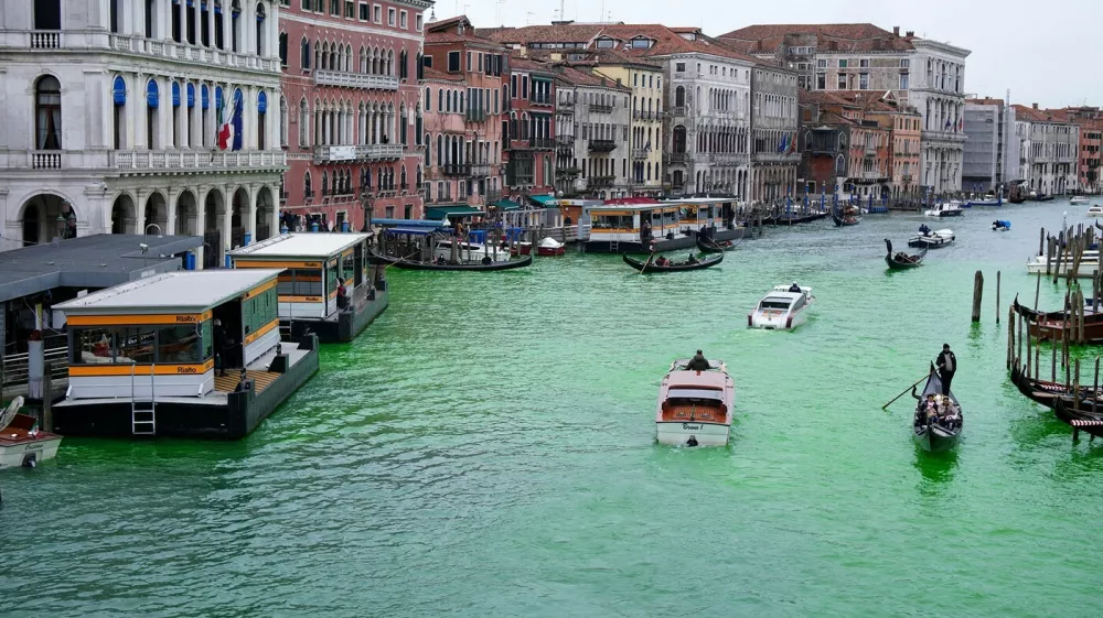 A handout photograph taken and released on November 22, 2025, by Extinction Rebellion Press Office, shows a general view of the Grand Canal in Venice with its waters dyed green during the "Stop Ecocide" demonstration origanized by Extinction Rebellion.,Image: 1053924310, License: Rights-managed, Restrictions: RESTRICTED TO EDITORIAL USE - MANDATORY CREDIT "AFP PHOTO / Extinction Rebellion Press Office" - HANDOUT - NO MARKETING NO ADVERTISING CAMPAIGNS - DISTRIBUTED AS A SERVICE TO CLIENTS, ***HANDOUT image or SOCIAL MEDIA IMAGE or FILMSTILL for EDITORIAL USE ONLY! * Please note: Fees charged by Profimedia are for the Profimedia's services only, and do not, nor are they intended to, convey to the user any ownership of Copyright or License in the material. Profimedia does not claim any ownership including but not limited to Copyright or License in the attached material. By publishing this material you (the user) expressly agree to indemnify and to hold Profimedia and its directors, shareholders and employees harmless from any loss, claims, damages, demands, expenses (including legal fees), or any causes of action or allegation against Profimedia arising out of or connected in any way with publication of the material. Profimedia does not claim any copyright or license in the attached materials. Any downloading fees charged by Profimedia are for Profimedia's services only. * Handling Fee Only ***, Model Release: no