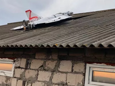 This image released by Moldova's Police on Tuesday, Nov. 25, 2025, shows a drone on the roof of a house in the village of Cuhurestii de Jos, northern Moldova, following Russian air attacks on Ukraine. (Moldova Police via AP)