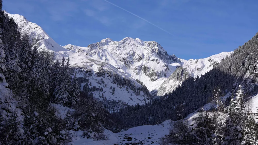 FILE - Snow covers the mountains at the Stubai glacier in Neustift im Stubaital, Tyrol, Austria, on Nov. 6, 2022. (AP Photo/Matthias Schrader, File)