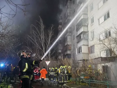 Firefighters put out a blaze after a Russian attack in Vyshgorod, outside of Kyiv, Ukraine, early Sunday, Nov. 30, 2025. (AP Photo/Efrem Lukatsky)