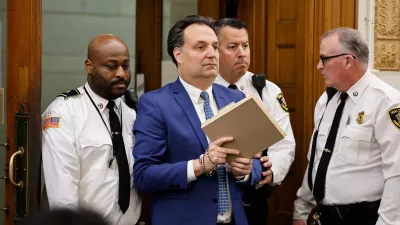 Brian Walshe is escorted into court for the afternoon session of the first day of the Brian Walshe murder trial in Norfolk Superior Court, Monday, Dec. 1, 2025, in Dedham, Mass. (Greg Derr/The Patriot Ledger via AP, Pool)