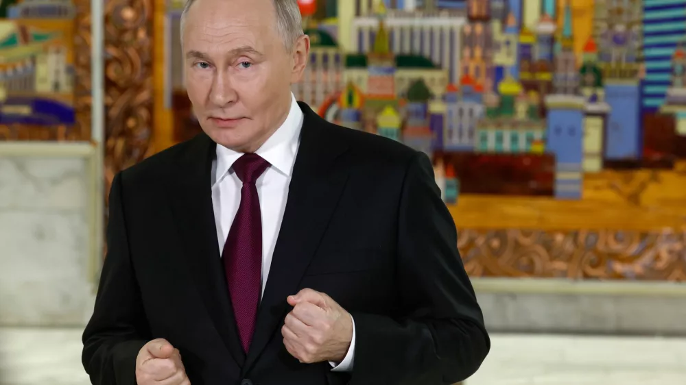 Russian President Vladimir Putin gestures while speaking to journalists after the plenary session of the VTB "Russia Calling" Investment forum in Moscow, Tuesday, Dec. 2, 2025. (Sergei Ilnitsky/Pool Photo via AP)