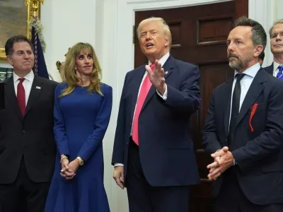 President Donald Trump speaks as Michael Dell, left, his wife Susan, Brad Gerstner and Treasury Secretary Scott Bessent listen during an event on "Trump Accounts" for kids in the Roosevelt Room of the White House, Tuesday, Dec. 2, 2025, in Washington. (AP Photo/Evan Vucci)
