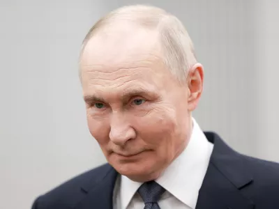 Russian President Vladimir Putin attends an international forum of civil participation "We Are Together" in Moscow, Russia, Wednesday, Dec. 3, 2025. (Alexander Shcherbak, Sputnik, Kremlin Pool Photo via AP)