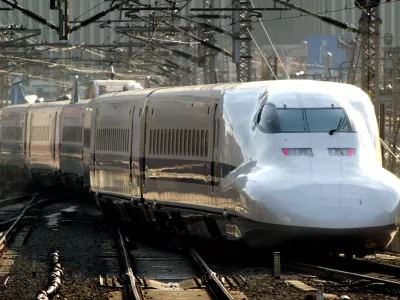 The latest type 700 of Japanese bullet train called "Shinkansen" leaves the Tokyo Railroad Station Monday, Dec. 30, 2002. Iron-wheeled "Shinkansen" with maximum speed of 350 kilometers per hour (220 mph) is the rival for Germany's magnetic levitation train which reaches 400 kilometers per hour (250 mph) in a race to receive Chinese order for its high-speed rail link between Beijing and Shanghai. German Chancellor Gerhard Schroeder will visit a maglev train project in Shanghai using German technology onTuesday for its promotion. (AP Photo/Itsuo Inouye)