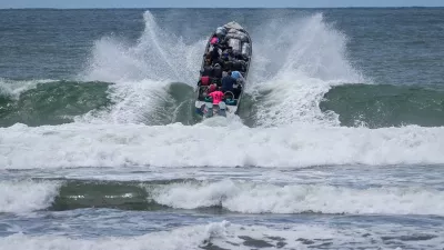 Venezuelan migrants depart Jaque on Panama's Pacific coast en route to Jurado, Colombia, as they return home after failing to enter the United States, Sept. 19, 2025. (AP Photo/Matias Delacroix, File)