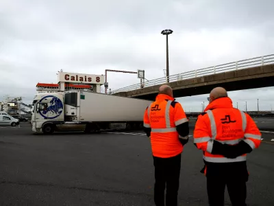 ﻿01 January 2021, France, Calais: Trucks arrive at the harbour of Calais after crossing from Britain on the day that the Brexit transition period ends and Britain leaves the EU single market and customs union four-and-a-half years after voting to leave the bloc. Hundreds of heavy goods vehicles early Friday passed through the Channel Tunnel connecting Britain and France "without any problem", its operator said, dispelling fears of immediate snarl-ups as Brexit took effect. Photo: Sameer Al-Doumy/AFP/dpa