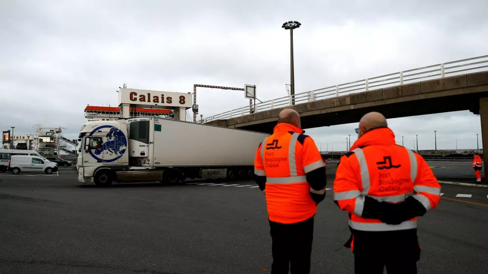 ﻿01 January 2021, France, Calais: Trucks arrive at the harbour of Calais after crossing from Britain on the day that the Brexit transition period ends and Britain leaves the EU single market and customs union four-and-a-half years after voting to leave the bloc. Hundreds of heavy goods vehicles early Friday passed through the Channel Tunnel connecting Britain and France "without any problem", its operator said, dispelling fears of immediate snarl-ups as Brexit took effect. Photo: Sameer Al-Doumy/AFP/dpa