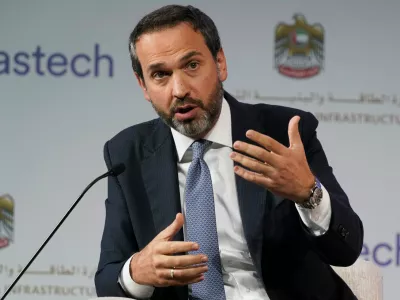 FILE -Turkish Deputy Energy Minister Alparslan Bayraktar gestures during a discussion on stage at the Gastech 2021 conference in Dubai, United Arab Emirates, Sept. 21, 2021. (AP Photo/Jon Gambrell, File)