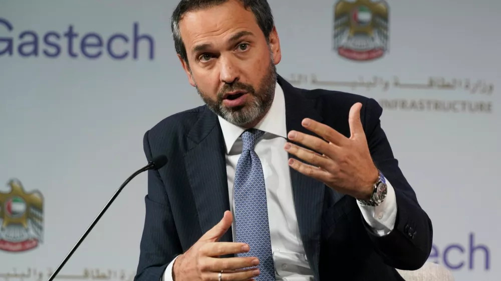 FILE -Turkish Deputy Energy Minister Alparslan Bayraktar gestures during a discussion on stage at the Gastech 2021 conference in Dubai, United Arab Emirates, Sept. 21, 2021. (AP Photo/Jon Gambrell, File)