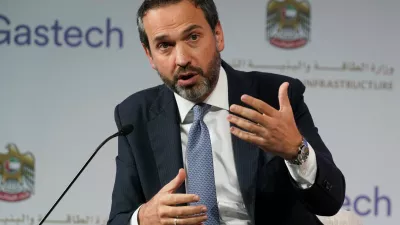 FILE -Turkish Deputy Energy Minister Alparslan Bayraktar gestures during a discussion on stage at the Gastech 2021 conference in Dubai, United Arab Emirates, Sept. 21, 2021. (AP Photo/Jon Gambrell, File)