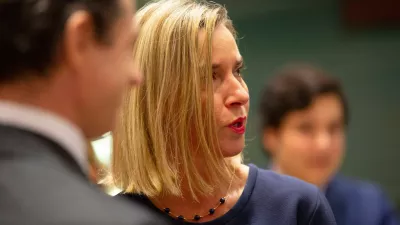 FILE -European Union foreign policy chief Federica Mogherini, right, attends a meeting of EU foreign ministers at the EU Council building in Brussels, Nov. 25, 2019. (AP Photo/Virginia Mayo, File)