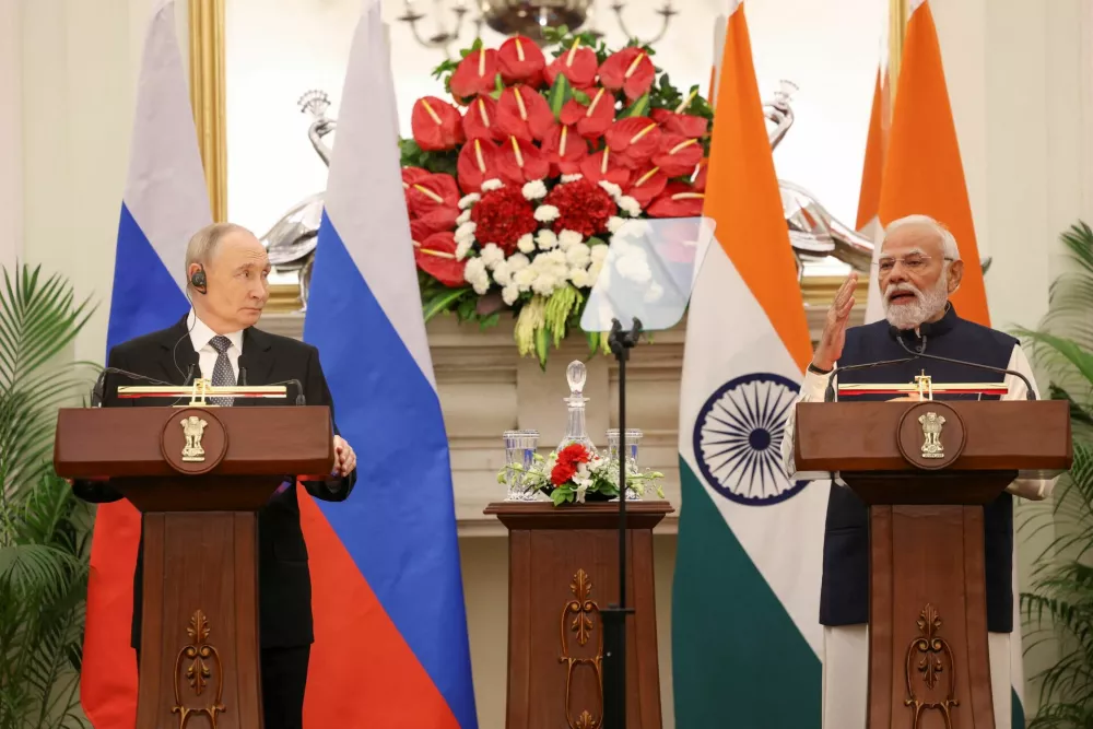 Russian President Vladimir Putin and India's Prime Minister Narendra Modi attend a presentation of a joint statement after their delegation level talks at Hyderabad House in New Delhi, India, December 5, 2025. REUTERS/Adnan Abidi