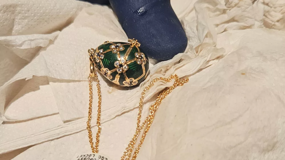 In this photo provided by the New Zealand Police a Fabergé pendant is held after it was recovered, Thursday, Dec. 4, 2025, from a man accused of stealing and swallowing the pendant. (New Zealand Police via AP)
