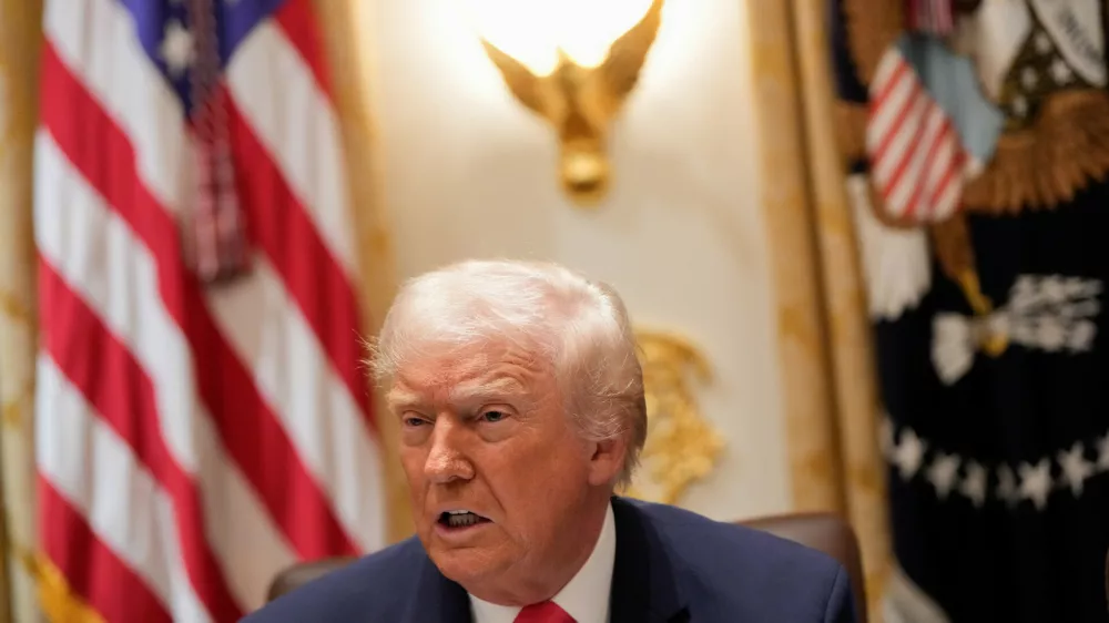President Donald Trump speaks during a Cabinet meeting at the White House, Tuesday, Dec. 2, 2025, in Washington. (AP Photo/Julia Demaree Nikhinson)
