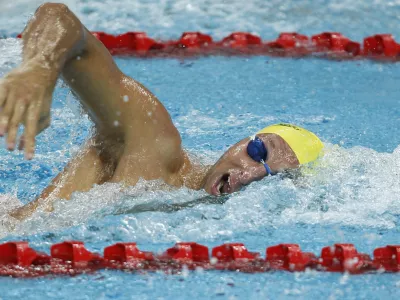 Former Olympic swimming champion Ian Thorpe of Australia competes in Men's 100 meter freestyle heat at the FINA-ARENA Swimming World Cup in Beijing, China, Tuesday, Nov. 8, 2011. Thorpe failed to qualify for the 100 meter freestyle final. (AP Photo/Alexander F. Yuan)