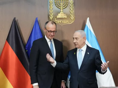 12 July 2025, ---, Jerusalem: German Chancellor Friedrich Merz (L) stands next to Benjamin Netanyahu, Prime Minister of Israel, before talks at the seat of government. Merz's inaugural visit to Israel will focus on stabilizing the ceasefire in Gaza, the ongoing peace process and German-Israeli relations. Photo: Michael Kappeler/dpa